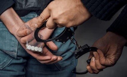 police-officer-man-arrested-drug-260nw-1646901109
